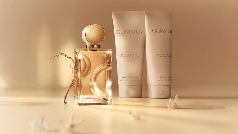 photo of estee lauder fragrance products for layering glimmer eau de parfum and ancillaries