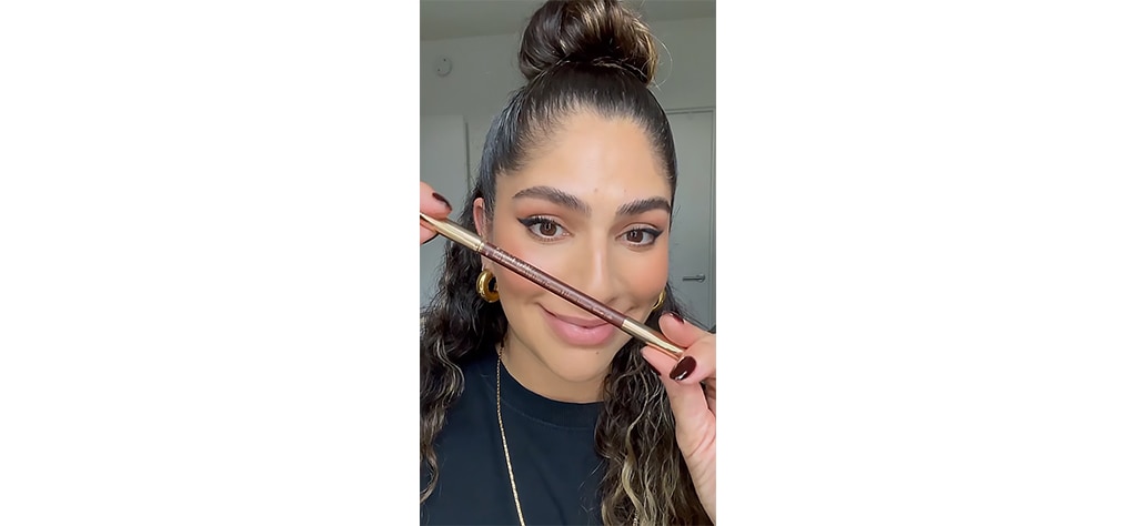 woman trying glass lip trend