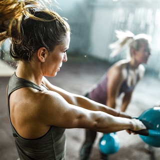 photo of women doing longevity workout routine